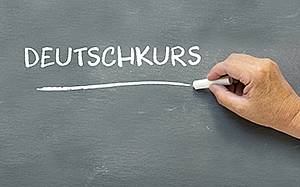 Wortlaut Deutschkurs auf Tafel geschrieben