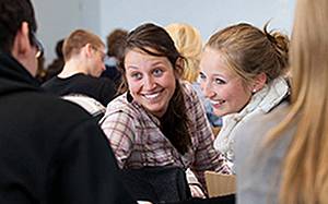 People smiling at each oter